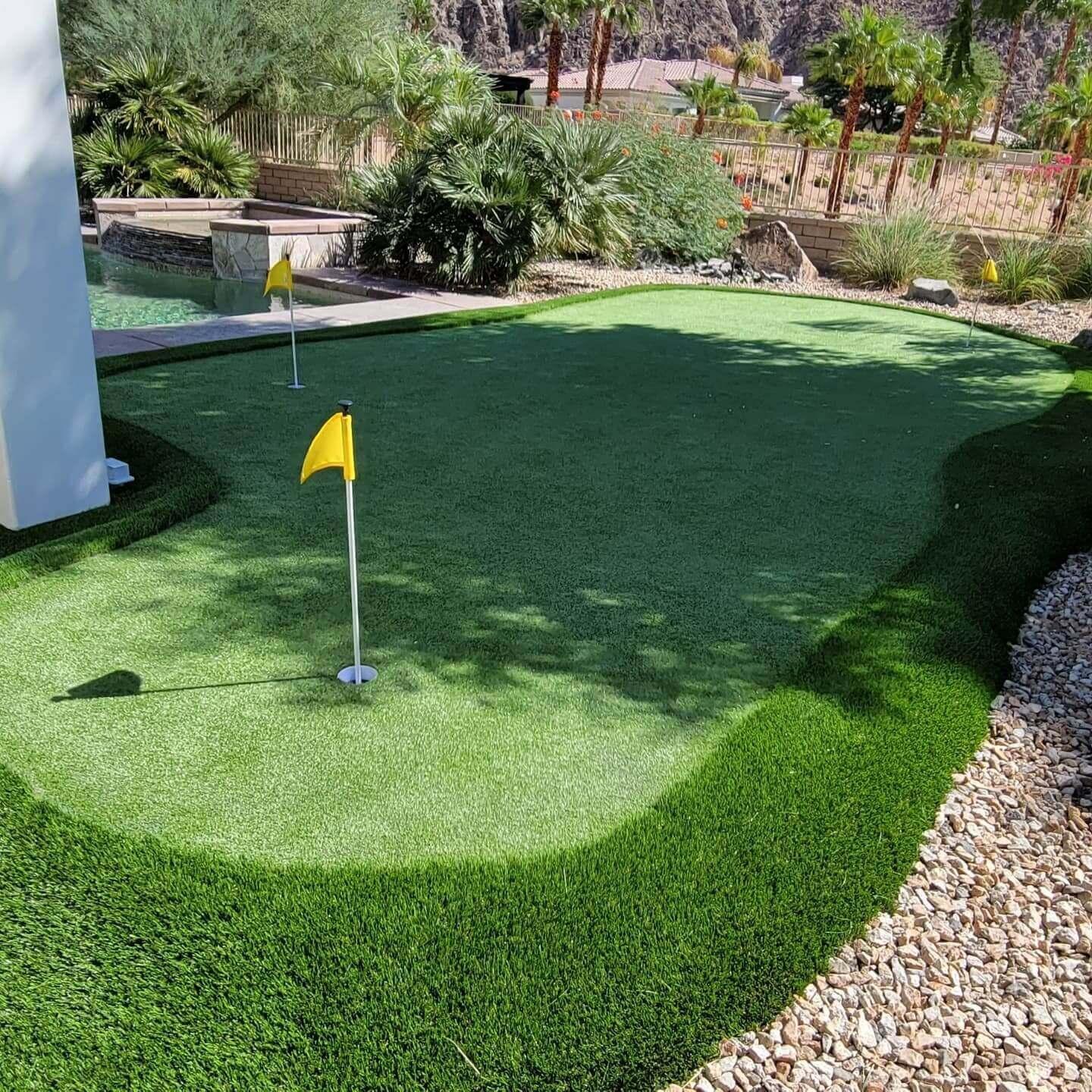 Landscape design with putting green